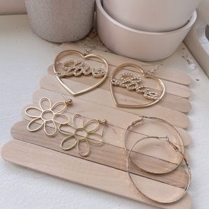 Set of three gold earrings